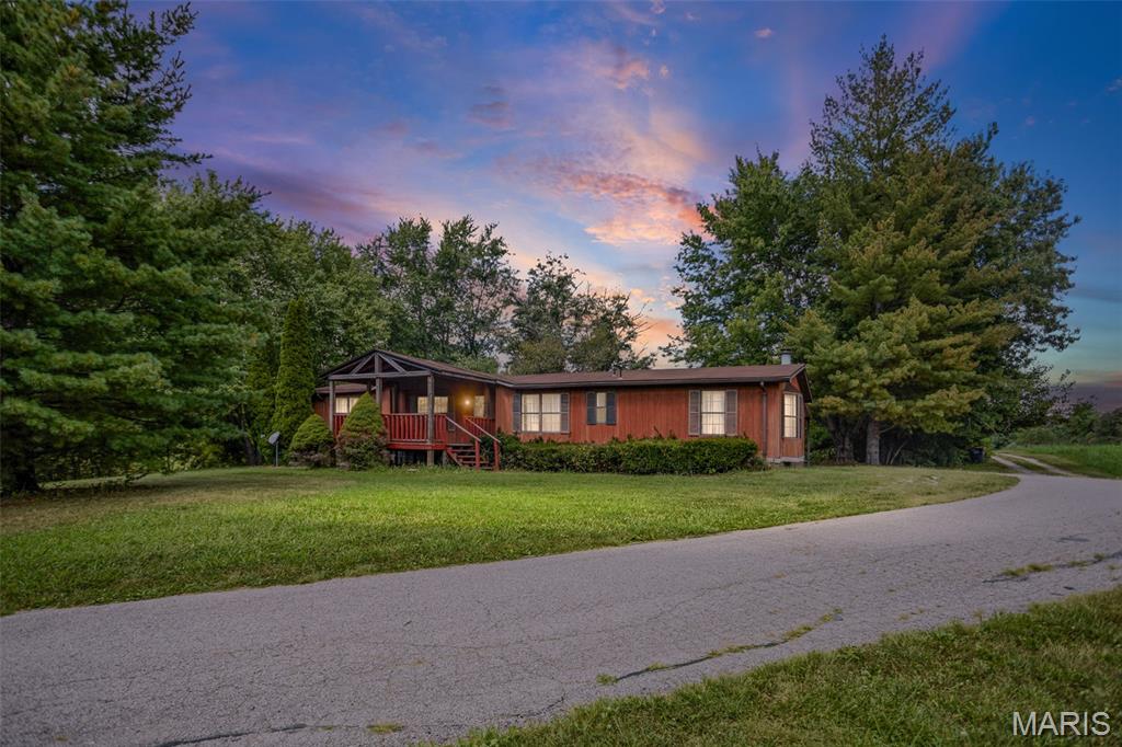 This 3 bedroom, 2 bath mobile home includes over 1,900sq ft of living space, and is situated on nice 1 acre +/- lot with walnut, cherry, and pecan trees. , home sits on a permanent foundation, and is ready to be moved into and enjoyed. Home is across the street from Cronin Rd