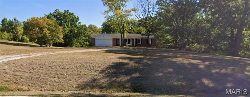 1433sf residential house that sites on 2.89 acres.  Currently zoned C-3 Highway Commercial.  With it's great location and easy access this property would be perfect for a variety of users, including office, retail, service commercial, and institutional.  Agent is related to owner but is not a principal. Location: City, Suburban