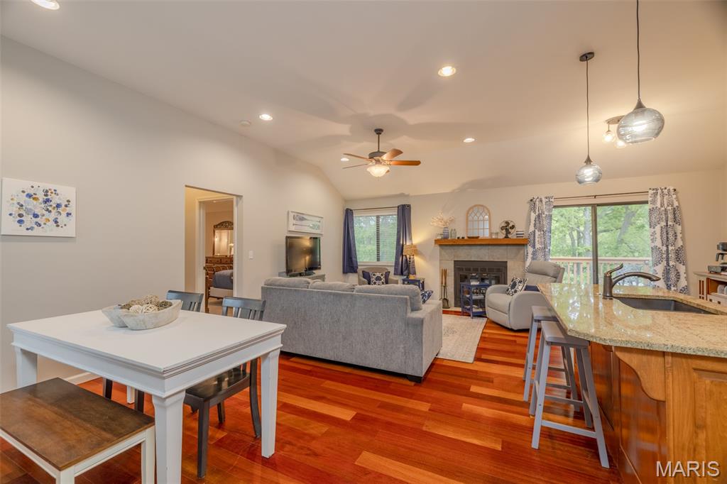 Now’s your chance to experience low-maintenance living at Innsbrook Resort with this beautifully updated 2-bedroom, 2-bath condo overlooking the lake. This well kept, fully furnished property is move-in ready. Inside, you’ll love the open-concept layout featuring custom cabinetry, granite countertops, stainless steel appliances, and a large center island in the kitchen that flows seamlessly into the living and dining areas. The dishwasher and refrigerator were both replaced in 2025. Cozy up around the fireplace for movie night or start your mornings at the charming coffee bar. The spacious dining area is perfect for hosting game nights with friends or sharing meals with neighbors. Both bedrooms feature large, beautifully finished bathrooms complete with custom vanity cabinetry, attractive tile work, and large tub/shower combinations. An owner’s storage closet provides plenty of room for golf clubs, lake toys, and more. Step outside to enjoy peaceful sunrises from the deck overlooking the water. The deck and porch have also been recently stained by the HOA, adding to the condo’s fresh, well-maintained appeal. Even better, this property is currently operating as a successful rental with future bookings already scheduled. Enjoy it exclusively for yourself or offset ownership costs through rentals. Whether you’re searching for a full-time residence, weekend getaway, or vacation investment property, this beautiful condo is ready to enjoy. Come explore everything Innsbrook Resort has to offer!