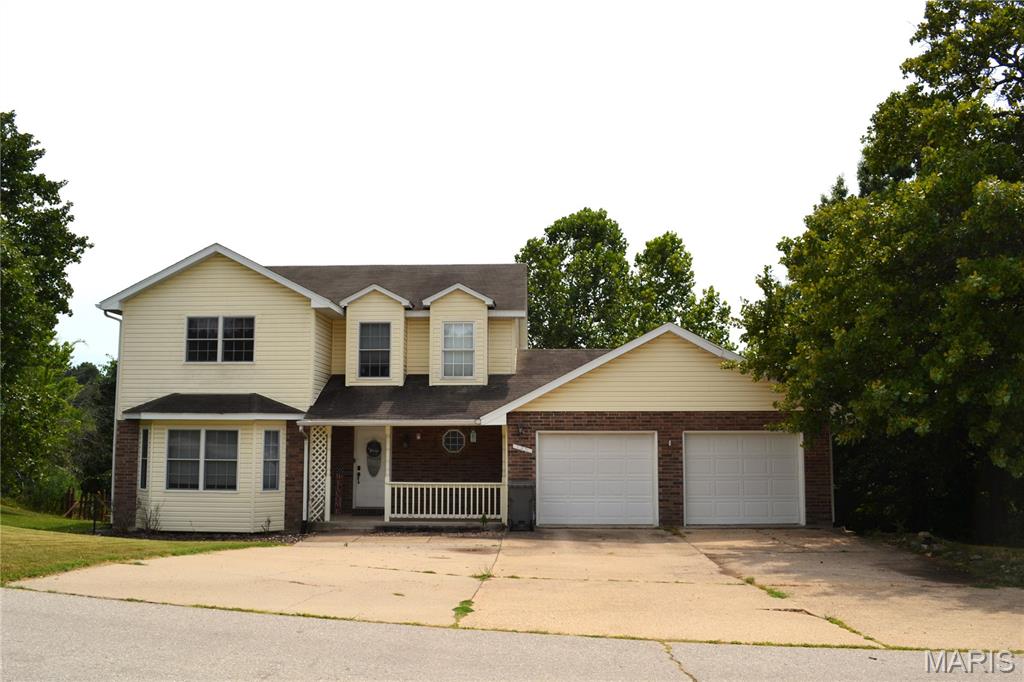 PRICED TO SELL!!!  Fantastic 4 bedroom 3 1/2 bath home with approximately 3250 sq. ft of living space, in a great subdivision close to everything!!  Beautiful kitchen with plenty of cabinets, counter space, center island that stays, and a pantry.  Separate dining room big enough for a large table for gatherings.  Upstairs features 3 bedrooms, and 2 full baths.  Hang out in the basement that has another family room with walk out access to the backyard, laundry room, 4th bedroom, full bath with a jetted tub and 2 storage rooms.   Backyard has a shed, a water feature, and is fenced. Oversized 2 car garage.  Don't miss out on this spacious home! Schedule your showing today!