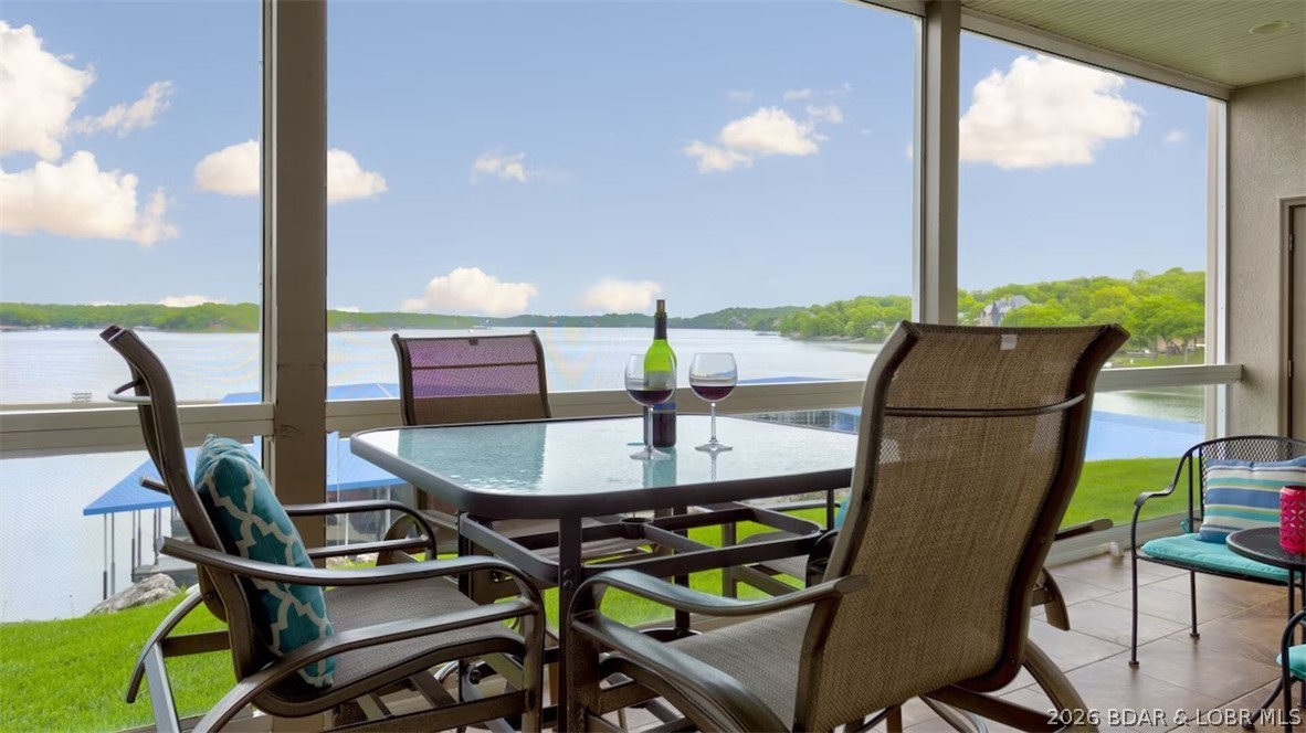 Don’t be the buyer who looks back and says, “I should have bought that one.” This Lands’ End property is positioned directly across from the new Oasis development, one of Osage Beach’s most exciting upcoming destinations with roller coasters, a Ferris wheel, rides, an indoor/outdoor amphitheater, and an indoor water park and comes turn-key. Combine that with Lands’ End’s resort-style amenities, including a pool, lazy river, splash pad, billiards, clubhouse, fitness center, playground, and basketball court, and you have a property that delivers both lifestyle and investment appeal. Even better, this property includes a 12x36 boat slip. There is a PWC slip available for additional cost. Opportunities like this do not come along often. You'll want to see this one before it is too late.