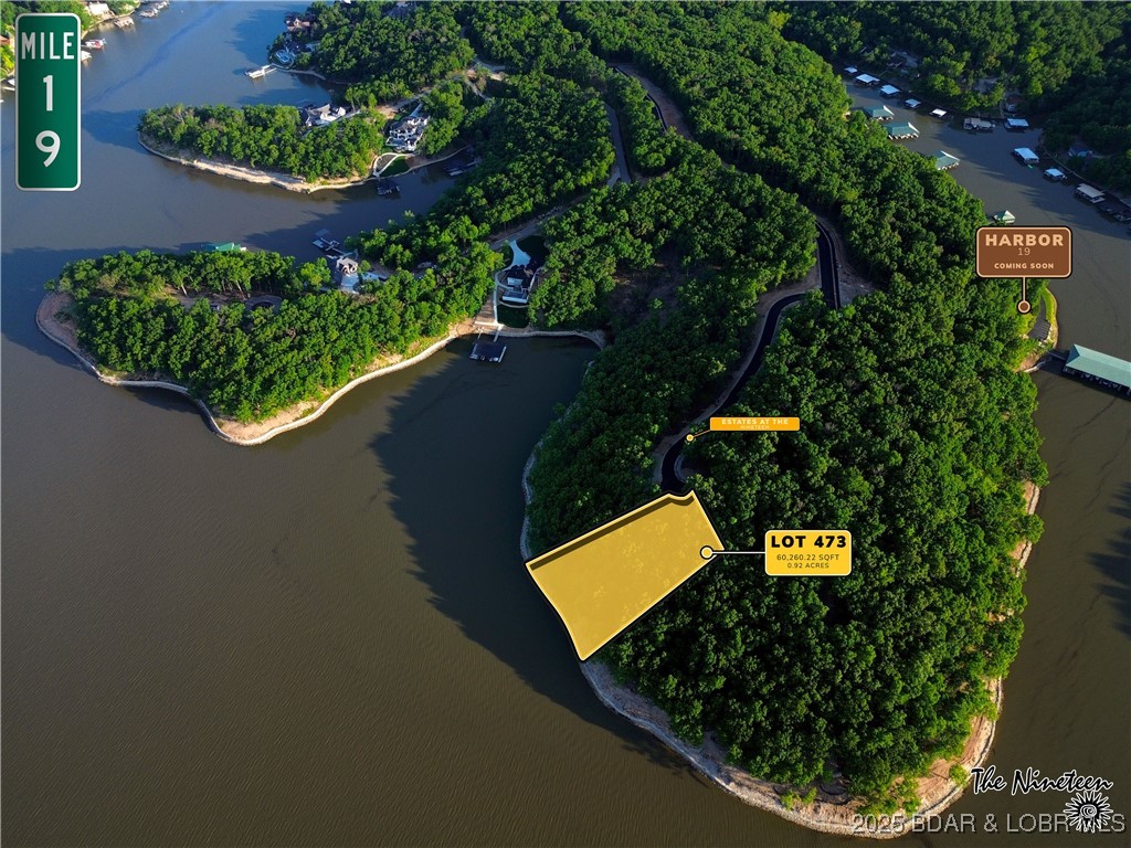 **Exquisite Lakefront Lot at Lake of the Ozarks – A Once-in-a-Lifetime Opportunity**

Introducing the finest lakefront lot at Lake of the Ozarks—now available for discerning buyers. Nestled within the prestigious, brand-new enclave of The Villages at Shawnee Bend, this exceptional property offers a prime location on the lake’s most coveted stretch of waterfront. 

Set on the 19 Mile Marker, within the exclusive new development, The Nineteen, this unparalleled lot boasts a contiguous limestone seawall and a view that captures the essence of lakefront living at its absolute best. The extraordinary main channel vista and an enviable position within this sought-after community elevate this property to the pinnacle of luxury.

This is the perfect canvas for your custom luxury estate, designed to your exacting specifications. The Villages at Shawnee Bend is a rare gem, offering access to an array of upscale amenities, including community water, central sewer, and fiber-optic internet, all provided via discreet underground infrastructure.

Build the lakefront masterpiece of your dreams and embrace the unrivaled beauty of Lake of the Ozarks.