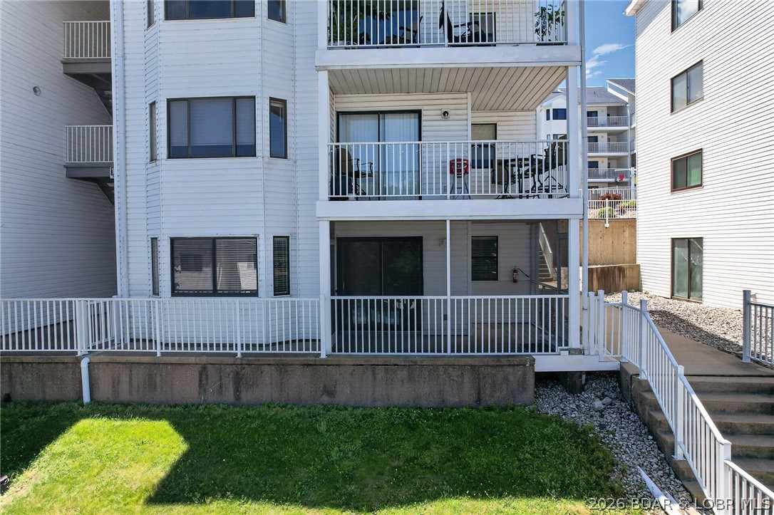 Here's your chance to own this freshly painted and cleaned 2nd tier lakeview unit at Compass Pointe Condos right in the heart of all the action in Osage Beach.  Close to restaurants, stores and the new Mall plans plus Oasis amusement park.  You could walk everywhere!  2-bedroom, 2 bath, 1276 square feet with a great screened in porch only 1 flight of steps down from the pool rec area.  Furnish as you will.  No need to buy someone else's furniture.  Large bedrooms and living room, updated appliances and 2 master suites (1 is a lock out).  Rentals are great here either full time or weekend rentals, so investors pay attention!  Or first-time homeowners this is a great way to start. See it today!!!