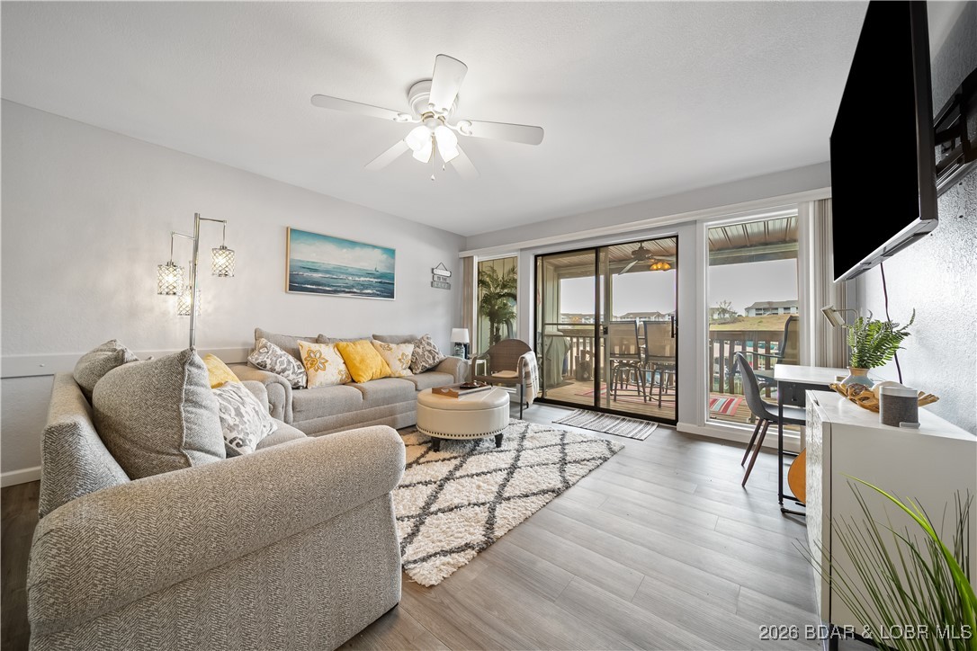 Meticulously maintained and thoughtfully decorated, this two bedroom, two bathroom condo is move in ready! Whether you are seeking your own private get a way or looking for an investment opportunity just minutes from some the best shopping, dining & entertainment the lake has to offer. Year-round income potential! Complex amenities include indoor pool/lakefront outdoor pool, hot tub, club house, playground, tennis courts, picnic and park area, boat ramp, trailer parking, fish/swim dock, dog walking park, and ample boat and trailer parking. Sellers are currently leasing 10x28 slip - new owners can continue to do so! The boat slip has a transferrable annual lease. Offered turnkey this condo is waiting you!