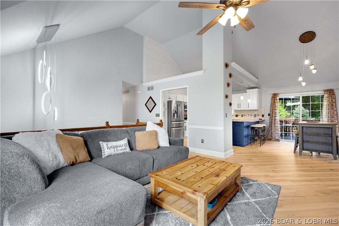Discover this fantastic find in the heart of Osage Beach! This updated, split-level home combines a modern feel with a great layout. You'll love the vaulted ceilings, new premium flooring throughout and a captivating, wood burning fireplace. The kitchen is a dream with plenty of cabinet space & granite countertops, perfect for entertaining. The master suite offers a relaxing retreat w/ heated jacuzzi tub, double sinks with walk-in shower & closet. The lower level features a large family room & a half bath, which can easily be converted into a full bath. This home is truly move-in ready with a new hot water tank, roof, gutters, fascia, & soffit. The new front & back decks are ideal for outdoor living, & one is even equipped to handle a hot tub. 2 car garage is great for storage. Located in a quiet neighborhood, no HOA ,rental flexibility & at the end of a cul-de-sac just off Hwy 54. Minutes away from restaurants, the outlet mall, & the new Oasis at Lakeport. Bonus:lot next door is available for purchase, offering an opportunity for more space & privacy. This is a must-see for anyone looking for a stylish, updated home in a prime location.