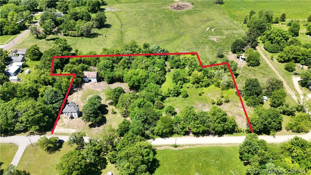 ULTIMATE RURAL FREEDOM WITH A HEAD START. Tucked away just outside the Olean city limits, this 4-acre unrestricted parcel offers the perfect foundation for your country homestead or next investment. While the vintage farmhouse on-site holds little financial value, it provides a massive logistical advantage: established water, sewer, and electric are already hooked up to the property, saving you thousands in utility installation costs.

The land also features a classic barn, ready for your tools, livestock, or conversion projects. With absolutely no restrictions, your imagination is the only limit. Use the existing footprint to build your dream custom home, barndominium, or place a manufactured home. This is a rare opportunity to secure private acreage with infrastructure already in place. Bring your builder and your vision.