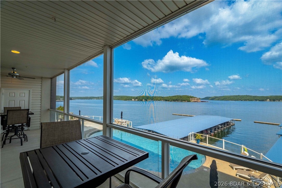 Lake living doesn’t get much better than this! This beautifully furnished 3-bedroom, 3-bath condo offers spectacular main channel views of the 31 Mile Marker and Four Corners, all from a peaceful, well-maintained complex where nightly rentals are not permitted. The oversized concrete screened-in deck is sure to become your favorite spot, offering plenty of space to entertain, unwind, and take in those incredible lake views. A private storage closet on the deck keeps your lake gear conveniently tucked away. Enjoy resort-style amenities including a pool, splash pad, clubhouse, and elevator access. Even better, this condo comes with a 12x36 boat slip with lift and a covered PWC slip with lift, so you can start enjoying the water from day one.  Looking for the complete setup?  Whether you’re searching for a weekend escape or your own place to call home at the lake, this property delivers the views, amenities, and lifestyle you’ve been looking for.