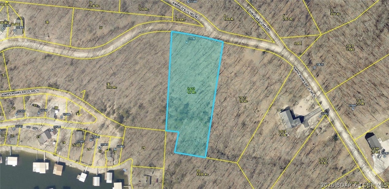 1.7 Acre Building Lot with Seasonal Lake View. Wooded Lot has Electric close by. This is the perfect country setting to build your dream home in this spacious and quiet subdivision with well maintained roads. Community water and sewer available. Located minutes from Jolly Rogers Restaurant and only 20 minutes to Lake of the Ozarks Famous Bagnell Dam Strip for Shopping, Restaurants & Entertainment. Home & extra Lots also for sale.