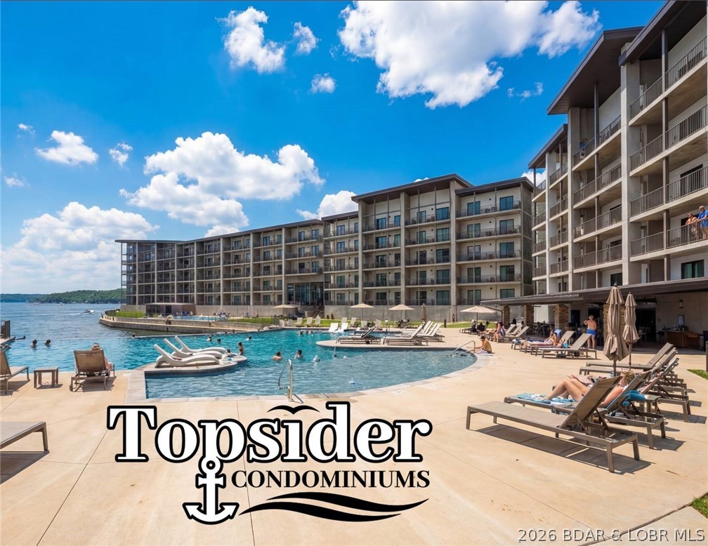 **RARE 16x48 Boat Slip + 21,000 lb Lift + New Topsider Condo!**

Unit 416 at Topsider Condominiums in the heart of Osage Beach delivers premier Lake of the Ozarks living! Located in the newest Building 4, this 3 bed, 3 bath, ~1,600 sq ft fourth-floor unit features fiama quartz countertops, modern finishes, and stunning sunset views. Enjoy a rare 16x48 boat slip with 30 amp shore power and a 21,000 lb remote-controlled boat lift—perfect for larger vessels. Topsider is the lake’s most exciting new community with two resort-style pools, EV charging, dog parks, and future pickleball courts. Directly across from Oasis at Lakeport and near top shopping, dining, and the State Park entrance—home of the Lake of the Ozarks Shootout.