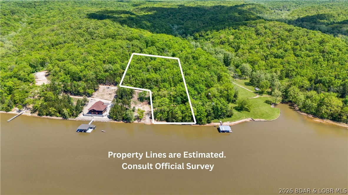 This beautiful parcel of land in Stover, Missouri offers a rare opportunity to own a versatile property with desirable natural features. The lot includes lake access and provides a combination of lakefront and lake view settings, making it ideal for those seeking both recreation and relaxation. The property is surrounded by mature trees, offering a wooded landscape that enhances privacy and creates a peaceful, secluded environment. 170 lakefront feet along dee0p water in Big Buffalo. CoMo connect already to this area, so easy access to internet. Area has shared use of boat ramp. 
Whether you are looking to build a primary residence, vacation retreat, or invest in land with strong appeal, this property offers flexibility and potential. The terrain provides multiple potential building sites, many of which take advantage of the scenic surroundings and water views.
Located in a quiet setting while still within reasonable distance to local amenities, this property balances seclusion with convenience. Enjoy boating, fishing, and outdoor activities nearby. a unique chance to secure a property that combines privacy, natural beauty, and lake-oriented living in one desirable location.