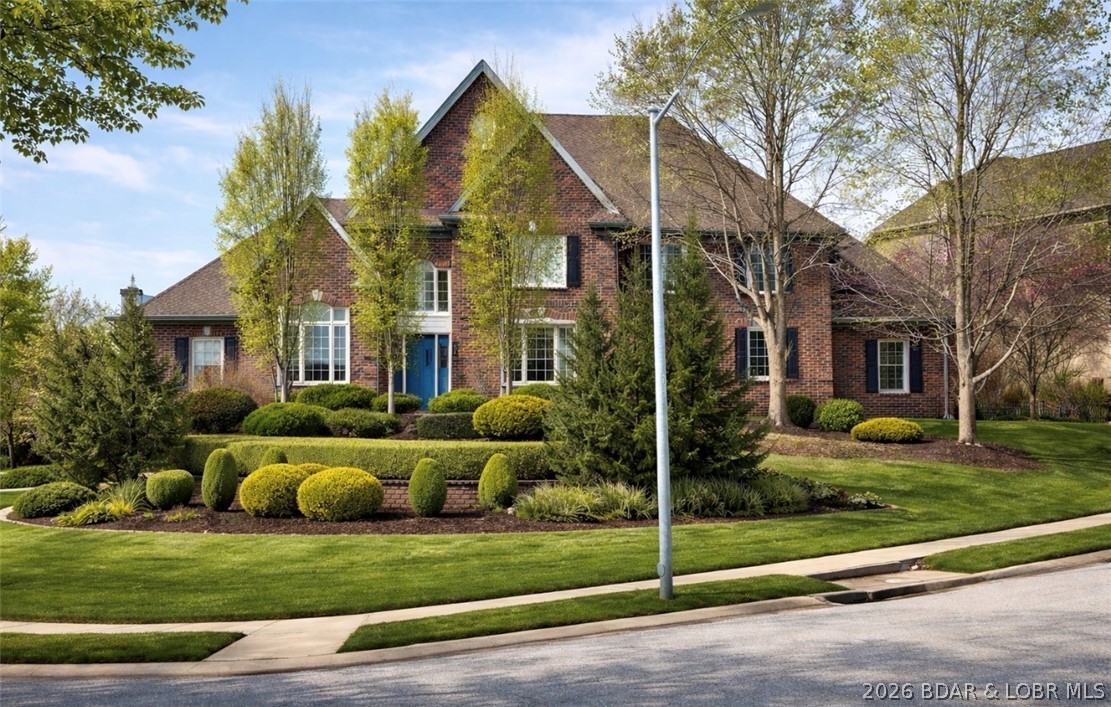 The backyard is a true showstopper—featuring a heated saltwater pool with ambient lighting and water features, outdoor kitchen, pergola, and gas fire pit—your own private retreat.

Inside, you’ll find soaring ceilings, hardwood floors, and a thoughtfully designed layout. The main-level primary suite offers a private escape, alongside a dedicated office and inviting hearth room. The chef’s kitchen is built to impress with a large island, double ovens, dual sinks, and a walk-in pantry, plus a formal dining room for hosting.

Upstairs offers three spacious bedrooms, each with walk-in closets, built-ins, and private baths.

The finished lower level is perfect for entertaining or relaxing, complete with a stylish bath and wet bar. A rare 5 car garage provides unmatched space for vehicles, storage, or hobbies.

Major updates include a 50-year roof and new HVAC. All set on a large corner lot in a highly desirable neighborhood.

This is the one that has it all—space, upgrades, and an unbeatable outdoor experience.
