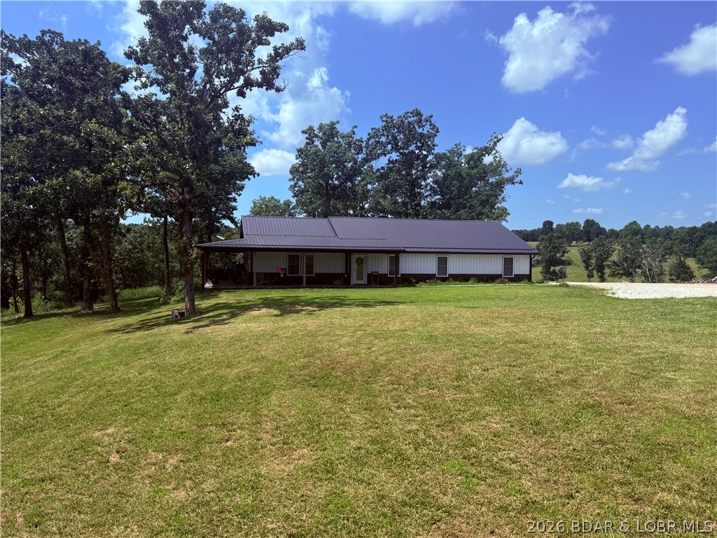 Priced below current appraisal and ready for new owners! Come view this custom home set on approx. 7 acres ready to make your homestead dreams come to life. Inside you'll find an open concept living with four bedrooms, three full bathrooms, an office/bonus room, and an oversized two car garage. From the vaulted ceilings, custom kitchen with granite countertops and all whirlpool appliances, and generous bedrooms to the expansive covered front porch, not a detailed was missed. The 24*30 shop with water and electric on site offers extra room for toys, tools, and everything in between. The possibilities are endless and the views are even better!
