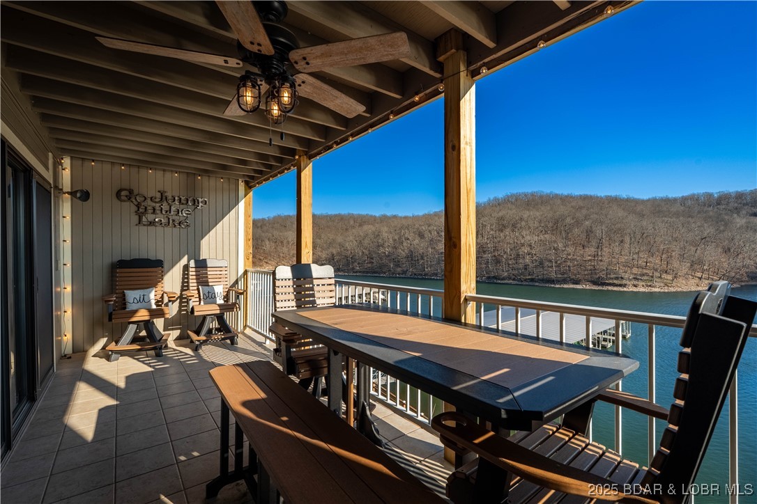 UPON SUCCESSFUL CLOSING SELLERS AGREE TO PAY ONE YEAR CONDO ASSESSMENTS FOR A YEAR! Lazy Days Condos at Lake of the Ozarks in Osage Beach offers a beautiful unit with only a few stairs from the parking lot. This fully furnished 2-bedroom, 2-bath condo includes a highly desirable 10x28 boat slip and has been tastefully updated. Both bathrooms have been fully remodeled w/state-of-the-art, top-of-the-line finishes, featuring modern vanities, heated floors and upgraded fixtures, along with stylish interior doors and interior enhancements. The kitchen features all new appliances, and nearly all furnishings have been replaced. Two new TVs, lake-life décor, custom signage, and an original painting of the lake displayed over the couch, and brand new Lake-Life patio furniture is included, kayaks, linens, bath & beach towels, cookware, small appliances, making this a truly turnkey property ready to enjoy immediately. Centrally located by land & water in the heart of Osage Beach Lazy Days is the spot! Known for its amenities which include two pools, playground, boat ramp, trailer parking, dog park, a lakeside boardwalk, all surrounded by the natural beauty of the State Park!