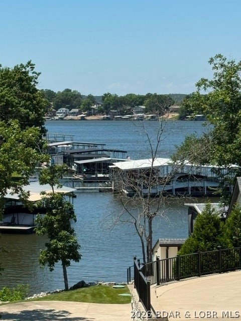 Unique opportunity to own four connected lots in Four Seasons totaling 2.5 acres!! The last lot in the sequence of lots has a small pocket of lake frontage with it. These lots are all gentle to moderate slope and would be ideal to build on. Wonderful lots to build multiple homes or build one home and keep the other lots for privacy. All homes that are built already are all very nice. Lots are located on a street that doesn't have a lot of homes and minimum traffic. Enjoy access to all of the Four Seasons amenities, including pools, indoor aquatic center, tennis courts, a dog park, playgrounds, and much more. Conveniently located near shopping, dining, schools and more.
