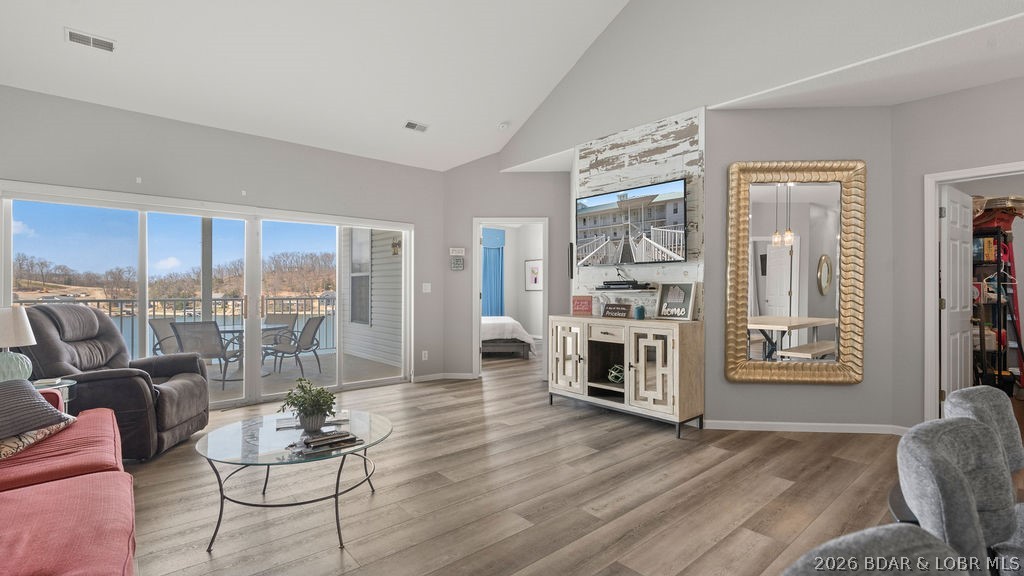 Top-floor living meets lakefront luxury at Newport Condominiums! Welcome to Unit 408—where soaring vaulted ceilings and an airy, open layout create a bright and inviting retreat. Recently updated with modern finishes and a new refrigerator, this move-in-ready condo offers both style and comfort. Enjoy the ease of elevator access with no steps, making every arrival effortless.
This unit truly shines with its exceptional waterfront package, featuring a 12x32 boat slip and two PWC slips, all tucked into a well-protected cove—perfect for maximizing your time on the water. Located at the highly desirable 1 MM of the Osage, you’re right in the heart of it all while still enjoying a peaceful setting. The spacious living and dining areas are filled with natural light, ideal for relaxing or entertaining. Plus, the unit comes fully furnished, including a washer and dryer, so you can start enjoying lake life immediately. Community amenities include a refreshing pool, perfect for unwinding after a day on the water. This is carefree, turnkey lake living at its best—don’t miss your chance to own a top-floor gem at Newport!