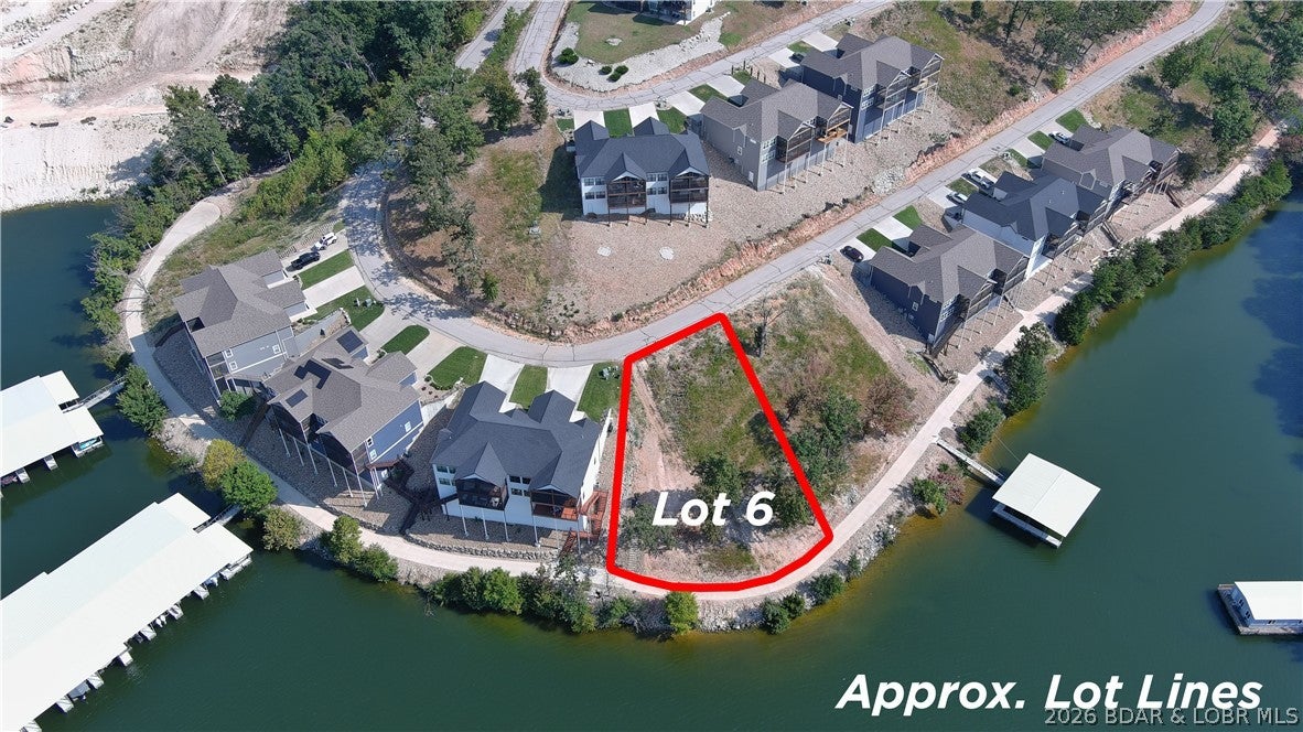 Amazing opportunity to purchase a lakefront lot in a well established subdivision. This lot will allow you to build a private home or a villa in The Villas of Tuscany Subdivision. This location is one of the most ideal lots within the subdivision. Amenities are already in place with water & sewer, internet access through Spectrum. You will enjoy the amazing pickle ball court, community pool & bath house, and golf cart path down to the community docks. Note- proposed structure shall be approved by Architecture Review Committee and landscaping will also need to be approved. (Subdivision will maintain landscaping of home, just as a Villa).NO PRIVATE WATER RIGHTS ON THIS LOT! Buyer will have to get a slip in community dock.