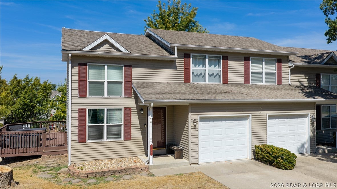 Lake views, low-maintenance living & a location that’s hard to beat! This end-unit 2 bed/1.5 bath townhome puts you right in the heart of Osage Beach. The spacious open floor plan features a large living area, updated kitchen with granite countertops, newer appliance & a large pantry. Major improvements include an HVAC replaced in 2023 and a NEW ROOF currently being installed! Step outside to the private wraparound deck and enjoy the convenience of having the community pool right outside your back door, perfect for summer days at the Lake. An attached garage adds even more convenience! Timberlane Estates puts you just minutes from Hwy 54 which gets you quickly to the Lake's best restaurants, grocery stores, shopping, entertainment & everything else Osage Beach has to offer. Whether you're looking for a full-time residence or a Lake getaway, this is an easy place to call home with the location to enjoy everything Osage Beach has to offer & low maintenance!