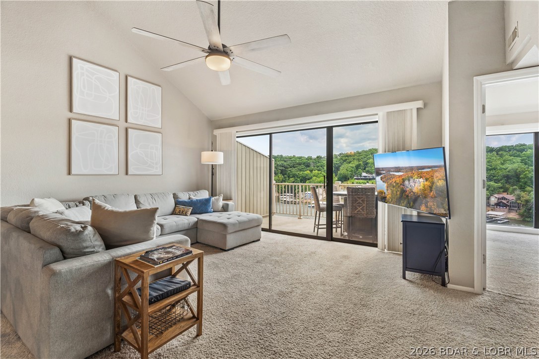 Wake up to panoramic main channel views while enjoying the protection of a peaceful cove in this turn-key, top-floor condo. Offering 3 bedrooms, 2 baths, with the loft serving as the third bedroom, this immaculate unit is ready for immediate enjoyment or rental income with nightly rentals allowed. Relax on the new deck overlooking the pool while taking in the incredible lake views. A 12x32 boat slip and dock box are included, making it easy to spend your days on the water. The resort-style complex offers outstanding amenities including three swimming pools (two heated), a clubhouse, tennis courts/pickle-ball, and basketball hoops. Whether you're looking for a full-time lake retreat, vacation home, or investment property, this condo checks all the boxes with an unbeatable combination of views, amenities, and rental potential.