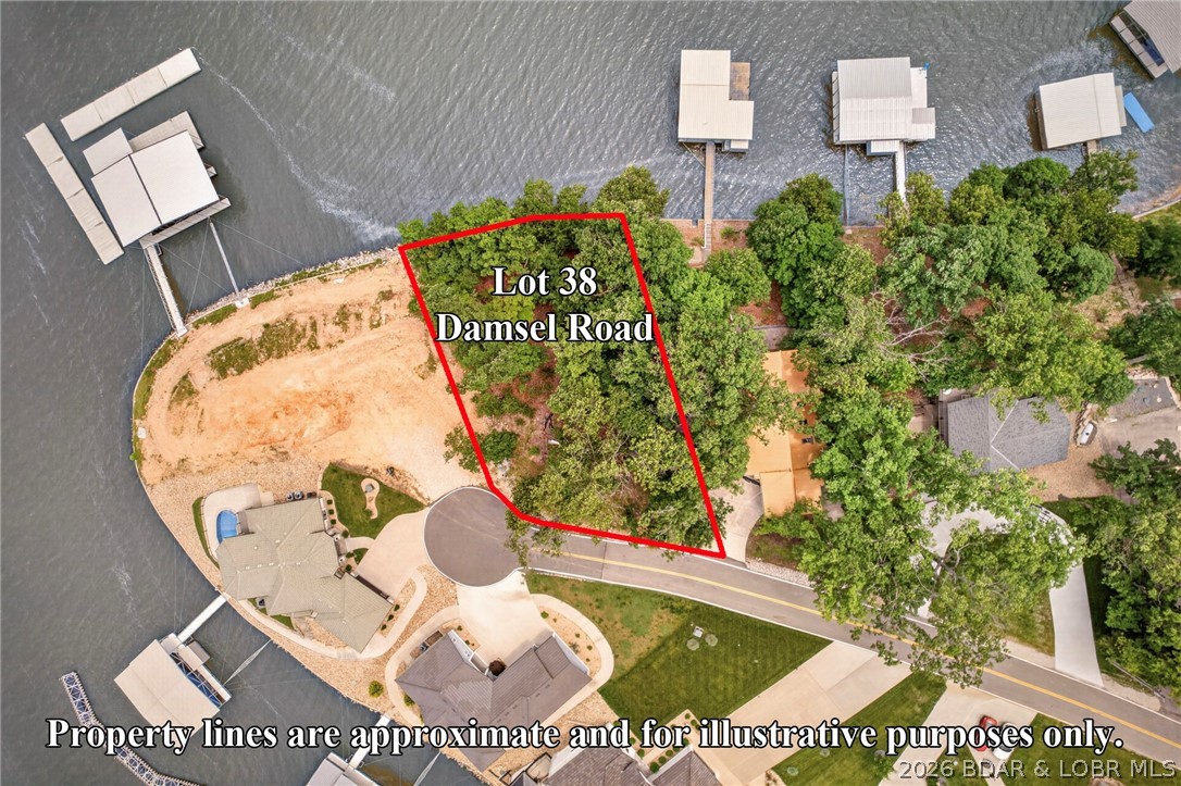 Build your dream lakefront retreat in one of the most sought-after areas at the Lake of the Ozarks. This exceptional waterfront lot offers 100 feet of shoreline on the 4.5-mile marker of the main lake, providing the perfect setting for enjoying breathtaking lake views, boating, and unforgettable sunsets. Located on exclusive Horseshoe Bend, this property combines privacy and convenience with no HOA restrictions and no subdivision assessments, giving you the freedom to create the lake home you've always envisioned without ongoing association fees. Centrally located by both land and water, you'll enjoy easy access to some of the lake's most popular waterfront restaurants, entertainment venues, championship golf courses, shopping, and recreational attractions. Whether you're looking for a full-time residence or a weekend getaway, this prime location places you in the heart of everything the Lake of the Ozarks has to offer. Rarely does an opportunity arise to own a premier main-channel lot in such a desirable location with the flexibility of no HOA and no assessments. Secure your piece of lakefront paradise and start planning your waterfront lifestyle today. Price is firm.