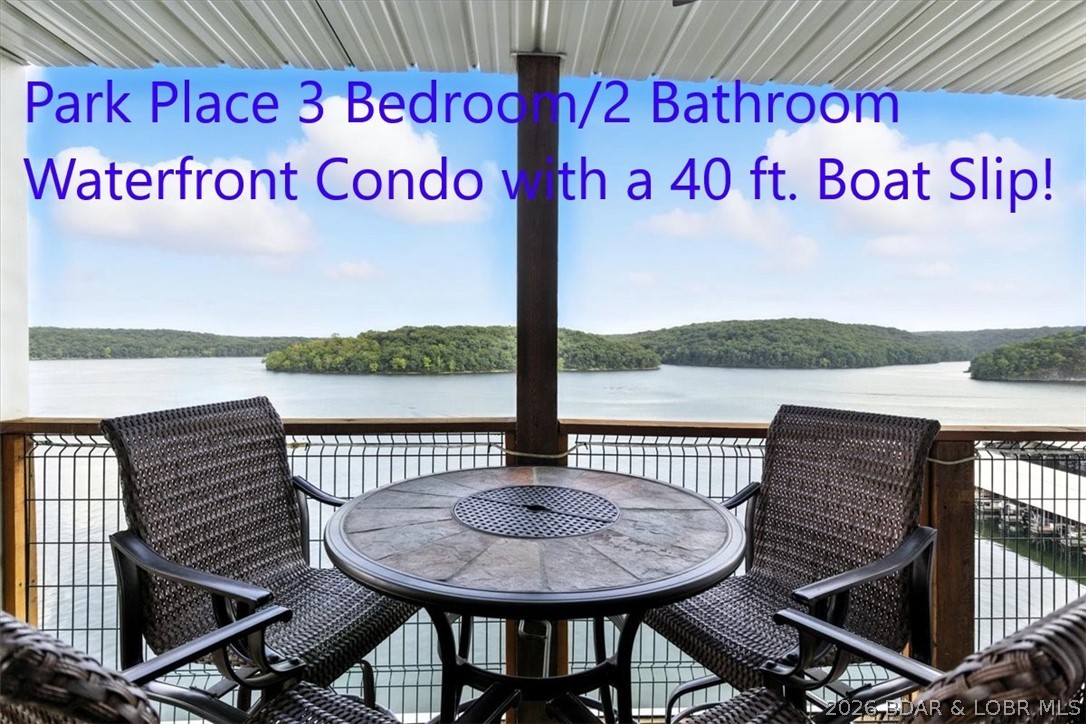 Price Reduced and the 40 Foot Boat Slip is Included! Waterfront Condo with a 16x40 Ft. Boat Slip located at the 5 MM in the Beautiful State Park Grand Glaize Area at Park Place on the Lake. 3 Bedrooms and 2 Full Bathrooms comes with an open floor plan. There is a large breakfast bar and it is open to the dining and family room with fireplace. Full-size front load washer and dryer set are in the main floor laundry room. Nice kitchen with walk-in pantry for extra storage. There is a newer water heater, approximately one-year old. The primary suite has an En Suite with a double bowl vanity and walk-in tile shower. The primary bedroom has a walk-in closet and sliding doors to the waterfront deck! Investors - Nightly rentals are allowed, but this is owner occupied and well-kept. The 16 x 40 foot boat slip near the end of Dock A is included in the sale. The Grand Glaize is hosting the 2026 Shootout and this is a prime location in the State Park area with easy access to the main channel at the 19 MM near all of the action in the Heart of Osage Beach, including the new upcoming Oasis at Lakeport Theme Park, Dog Days, Redhead's, Backwater Jacks and more!