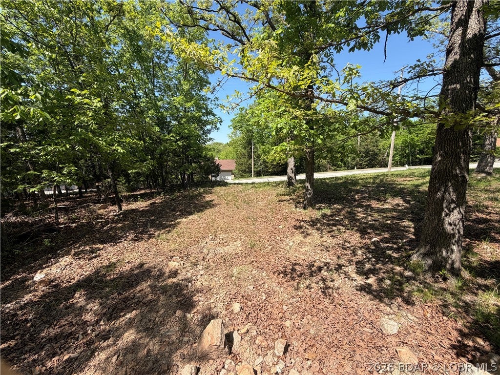 A rare opportunity to own an oversized lot in Osage Beach on Tier 2, offering lake access and a lake easement. This parcel features gentle terrain and nearby availability of city water and city sewer hookups.
Ready for you to custom-build your own retreat, full-time home, or weekend getaway in a peaceful setting close to shopping and the new Bass Pro development.