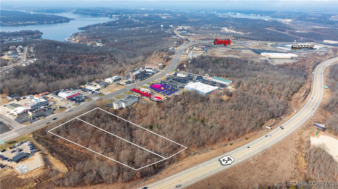 Over 3 Acres of commercial property in Osage Beach. These lots are priced right and offer 300ft of Osage Beach Pkwy frontage AND lot backs up to Hwy 54 for more exposure. Zone c-1 commercial. Great opportunity right near Scooters, Wendy's, Taco Bell and Across the street from Harbor Freight. Lots can be sold separte as well!