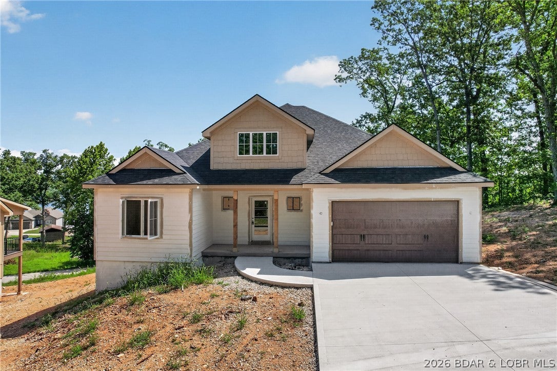Welcome to Diamond Crest Estates new construction, second tier with phenomenal Lake of the Ozarks views. Located at the 45 mile marker just off Highway 7, this stunning second-tier home offers phenomenal lake views and an ideal location for enjoying the lake lifestyle. Just over 3,200 sqft, this two story home features a spacious upper level that is finished and ready to enjoy, along with a lower level that is framed and ready to be completed to suit your vision. Whether you envision additional bedrooms, a home theater, game room or expansive entertainment space, the possibilities are yours to create. A two car garage provides ample storage for vehicles and lake toys, while the elevated setting captures beautiful lake views from the home. The home offers a rare opportunity to own a brand new home while adding your own personal touch. Come see the possibilities and make this Lake of the Ozarks retreat your own!