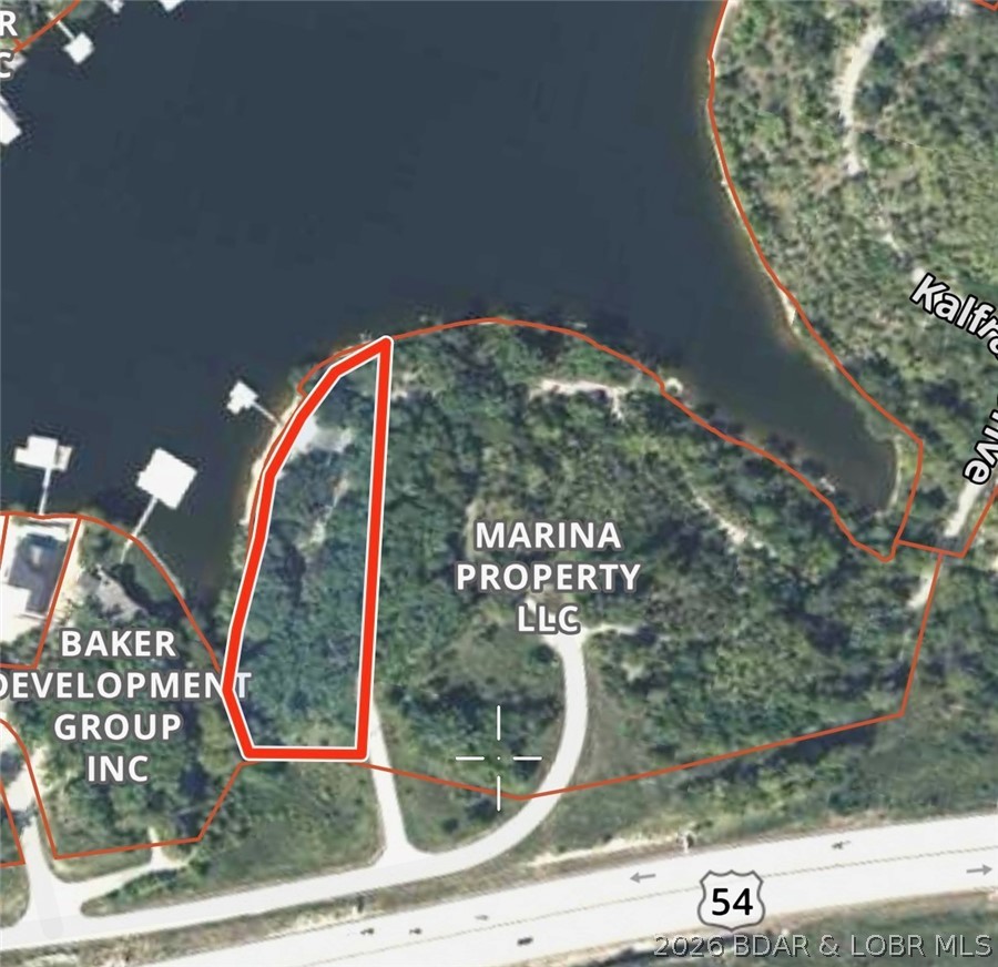 Value is in the land! Incredible 1.75± acre lakefront tract located just off Jeffries Road in Osage Beach near the future Oasis development. This gentle property offers excellent usability with beautiful waterfrontage in one of the most desirable and rapidly growing areas of Lake of the Ozarks. Property includes an existing home being sold strictly as-is with no information available regarding condition or systems. Whether you choose to renovate, rebuild, or redevelop, this property offers outstanding potential for a private estate, vacation home, or investment opportunity. Rare chance to own lakefront acreage in a highly sought-after location close to dining, entertainment, shopping, and lake attractions.