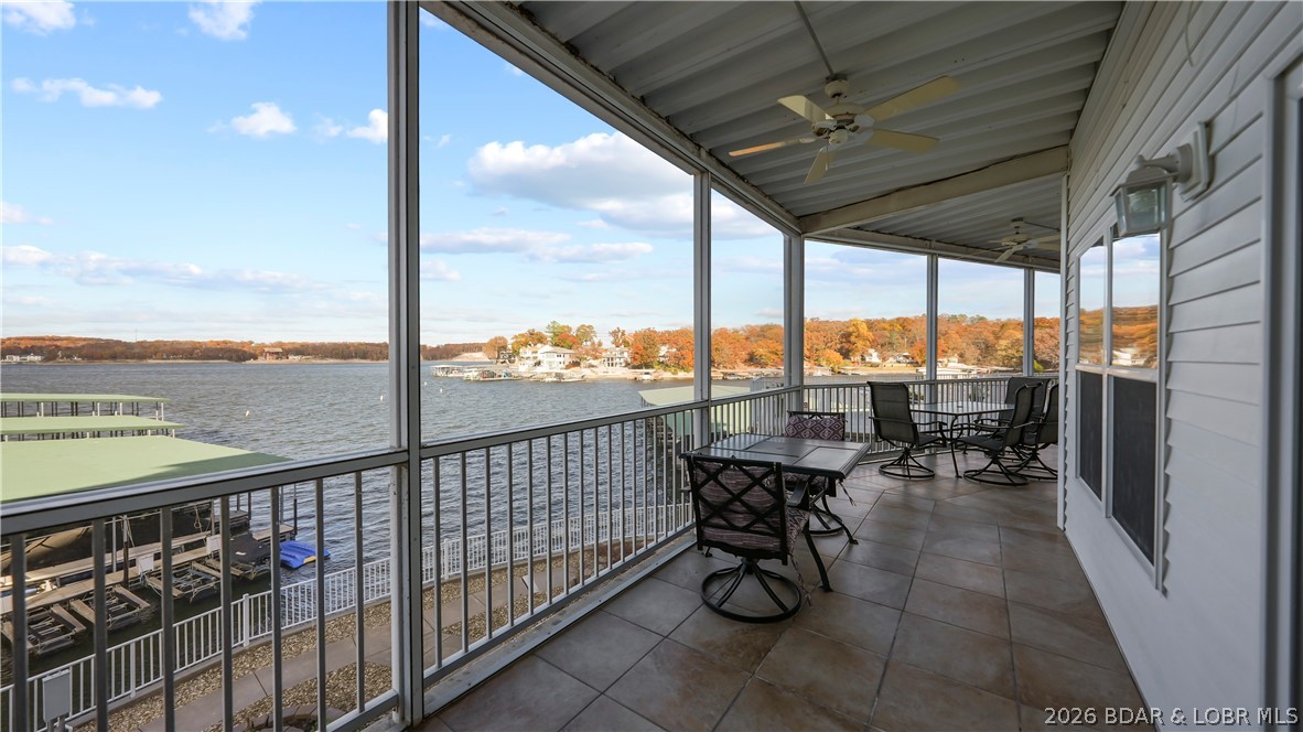 Three bedrooms, three full baths, two of those bedrooms lakeside with main channel views, walk-in level with no steps, a large screened porch, a 12x32 boat slip included, and built in a steel and concrete elevator building at the 20 mile marker in the heart of Osage Beach. That is what Unit A105 at Seascape Point on Lake of the Ozarks brings to the table and it is a combination that is genuinely hard to find at this price. The open floor plan features new Luxury Vinyl Plank flooring and an electric fireplace, both lakeside bedroom suites wake up to sunrise views over the water every single morning, the primary suite has an ensuite bath and walk-in closet, and the screened porch is where every lake evening belongs. The unit sits next to the community pool and the walk-in level design makes this as easy and accessible as lake living gets. Nightly vacation rentals are allowed and the nearly $500 million Oasis at Lakeport resort is under construction right down the road projecting 500,000 new visitors a year to Osage Beach. Dog Days, Margaritaville, Red Head Yacht Club, and Lake Regional Hospital are minutes away by land or by boat.