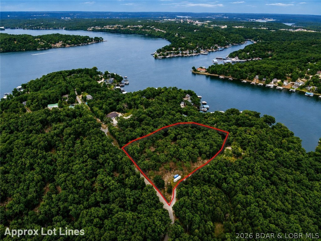 Discover the perfect blend of privacy, convenience, and opportunity with this 4.52-acre tract in the heart of Linn Creek, Missouri. Approximately half of the property features beautiful tabletop-flat ground that has already been partially cleared, making it an excellent head start for your dream project. Whether you're looking to build a private estate with room to spread out, create a family compound with multiple residences (subject to local regulations), or simply enjoy the space for a home with a large detached garage, workshop, RV storage, or additional outbuildings, this property offers the flexibility to bring your vision to life. Tucked away while still being just minutes from some of the Lake of the Ozarks' best shopping, dining, entertainment, and everyday conveniences, you'll enjoy the rare combination of peaceful acreage and an unbeatable location. If you've been searching for a property with usable land, endless potential, and close proximity to everything Linn Creek and Osage Beach have to offer, this is one you won't want to miss.