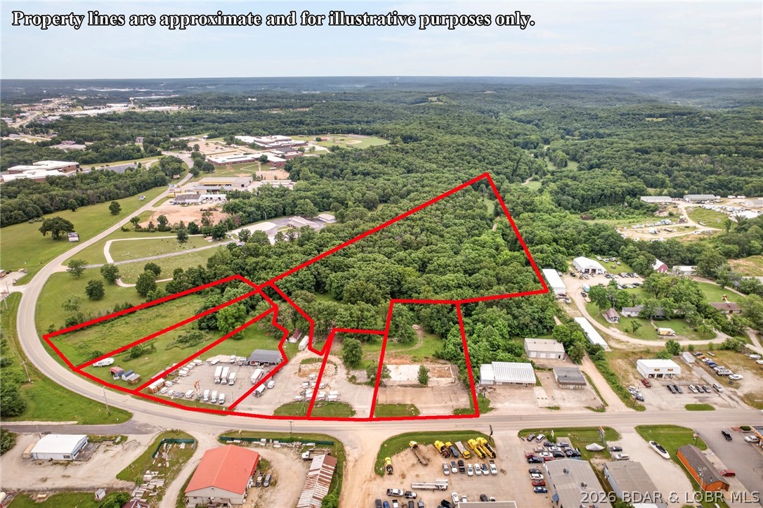 Located less than one mile from 3 School of the Osage campuses, just minutes from 54-42 junction, (Prewitt's Point: Lowes, Target, HY-Vee), this versatile 11-acre property offers exceptional potential for investors, developers, and entrepreneurs. Featuring six highway-front parcels that can be purchased separately or combined in multiple configurations, this property provides flexibility to fit a variety of development goals. Back acreage previously approved for a 57 unit tri-plex subdivision, consider multi-family, commercial space, mixed-use development, restaurant, health food store or the business you've always wanted to build. The property includes two wells and an office trailer currently occupied by a tenant. Excellent Hwy 42 frontage provides outstanding visibility and convenient access in one of the Lake area's growing corridors. Adding to its appeal, flights arriving and departing from nearby Lee C. Fine Memorial Airport, soon to have a jet-port, will drive pass by this highly visible location. With development options, flexible parcel layouts, and a strategic location in Osage Beach, this property presents a rare opportunity to invest in the future of the Lake area.