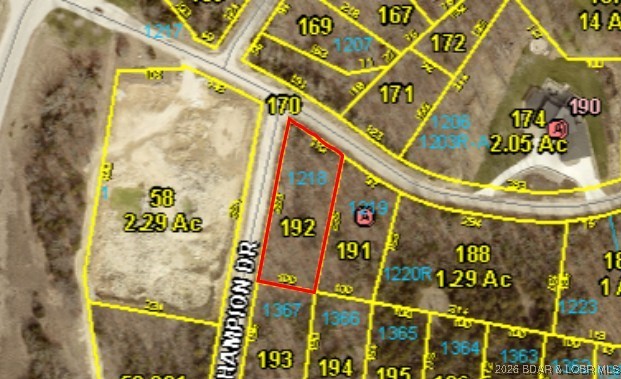 Lot 1218 is a .62-acre homesite in the highly desirable Champions Run Subdivision of Porto Cima—one of the Lake’s most prestigious luxury communities. Ownership includes the full Four Seasons amenity package, featuring multiple pools, a fitness center, playgrounds, tennis and pickleball courts, basketball, bocce ball, a dog park, campground, boat storage, and boat ramps as well as proximity and access to Porto Cima’s renowned amenities. Conveniently located just a couple of miles from the Community Bridge, this property places you minutes from grocery stores, gas, shopping, medical services, and many of the Lake of the Ozarks’ most popular destinations. Build now or hold for the future—this is an exceptional opportunity to secure your place in a premier neighborhood where lifestyle, convenience, and long-term value align.
