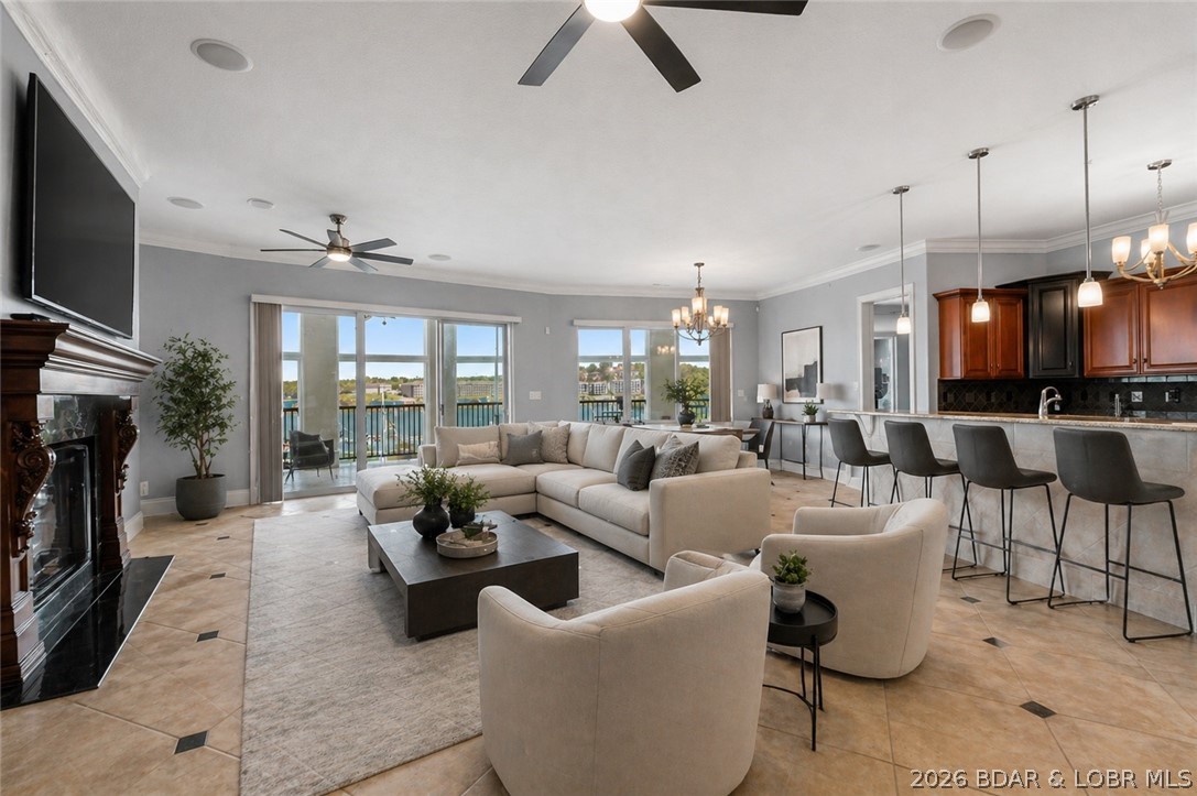 Experience lakefront living at its finest in this beautifully remodeled 3-bedroom, 3-bath wedge condo at the 19MM of the Lake of the Ozarks. This thoughtfully updated unit offers the perfect blend of comfort, style, and functionality. Step inside to find a modern, open-concept layout with high-end finishes and upgrades throughout. The standout feature is the incredible 3-seasons room/deck, complete with six sets of sliding glass doors that fully open—creating a seamless indoor-outdoor living experience and showcasing stunning lake views. Whether you're entertaining guests or enjoying a quiet morning by the water, this space is designed to impress. Located in a desirable area with easy access by land and water, this condo is ideal as a full-time residence, vacation getaway, or investment property. Don’t miss your chance to own a turnkey lakefront retreat in one of the most sought-after locations on Lake of the Ozarks.