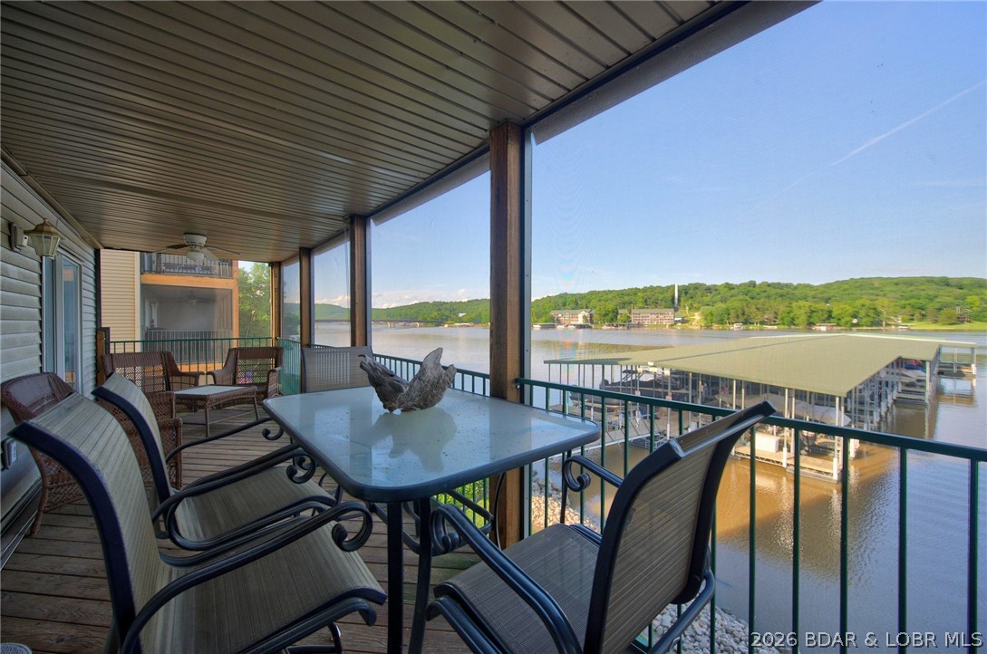 You're in luck just listed 3 bedroom 2 bath walk-in end unit is furnished with a slip ready for summer! Cedar Glen is a well maintined project and in demand by buyers that want the best. You'll enjoy level parking, two heated pools, well maintained grounds, featuring a playground, multiple dog stations, a sand volley ball court, owners boat ramp and a lakeside sidewalk with lovely garden spots.  Yourand your guests will love the easy access to the dock and pool. Plus near by there's so much to do golf at Lake Valley, dinner at Old Kinderhook and beautiful HaHaTonka to hike and enjoy being in the Ozarks, Call today and make it yours