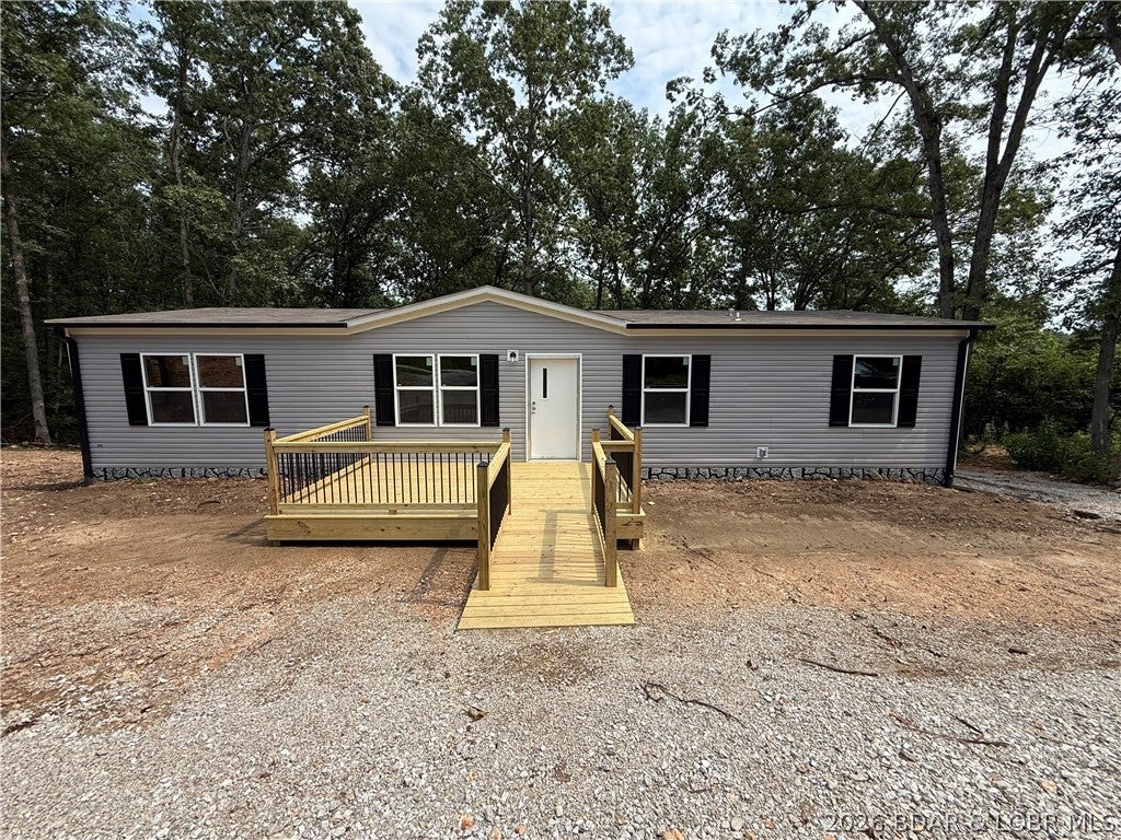 LOOKING FOR A BRAND NEW HOME with space, privacy, and room to grow? This one is worth a look! Stop by to take a  look at this brand new 3 bedroom, 2 bath manufactured home nestled on 3 beautiful acres, offering plenty of room to spread out and enjoy the peace and privacy of country living. This home is not only new so is the septic and well, brining peace of mind for years to come. 
Step inside to a spacious, open concept floor plan featuring a large living room, kitchen, and dining area perfect for gathering with family and friends.
 Move to the outside and enjoy the rest of the property from your large decks. Start your mornings with a cup of coffee on the front deck, then unwind on the back deck in the evening while taking in the wildlife, beautiful views. The property also features a circle driveway with plenty of room for parking with an additional cleared space to build a garage in the future.
And if 3 acres isn't quite enough, additional acreage is available for purchase which can provide you the opportunity to have even more space and privacy! Give me a call today to schedule your own private tour.