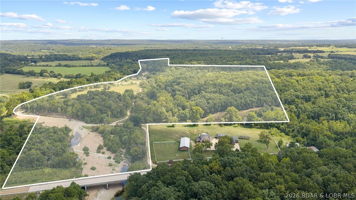 Rare opportunity to own 125 acres along Tavern Creek with highway access, excellent hunting, recreational opportunities, and potential for a gravel plant operation. The gravel-rich creek and convenient highway access make this property particularly attractive for an aggregate operation, while the acreage and natural terrain provide abundant opportunities for hunting, outdoor recreation, and investment. Located in a desirable area with easy access to the highway, this property offers a combination of location, natural resources, accessibility, and versatility that is hard to find. Whether you're looking for a potential gravel operation, a hunting property, or a recreational tract, this 125-acre property is worth a look.