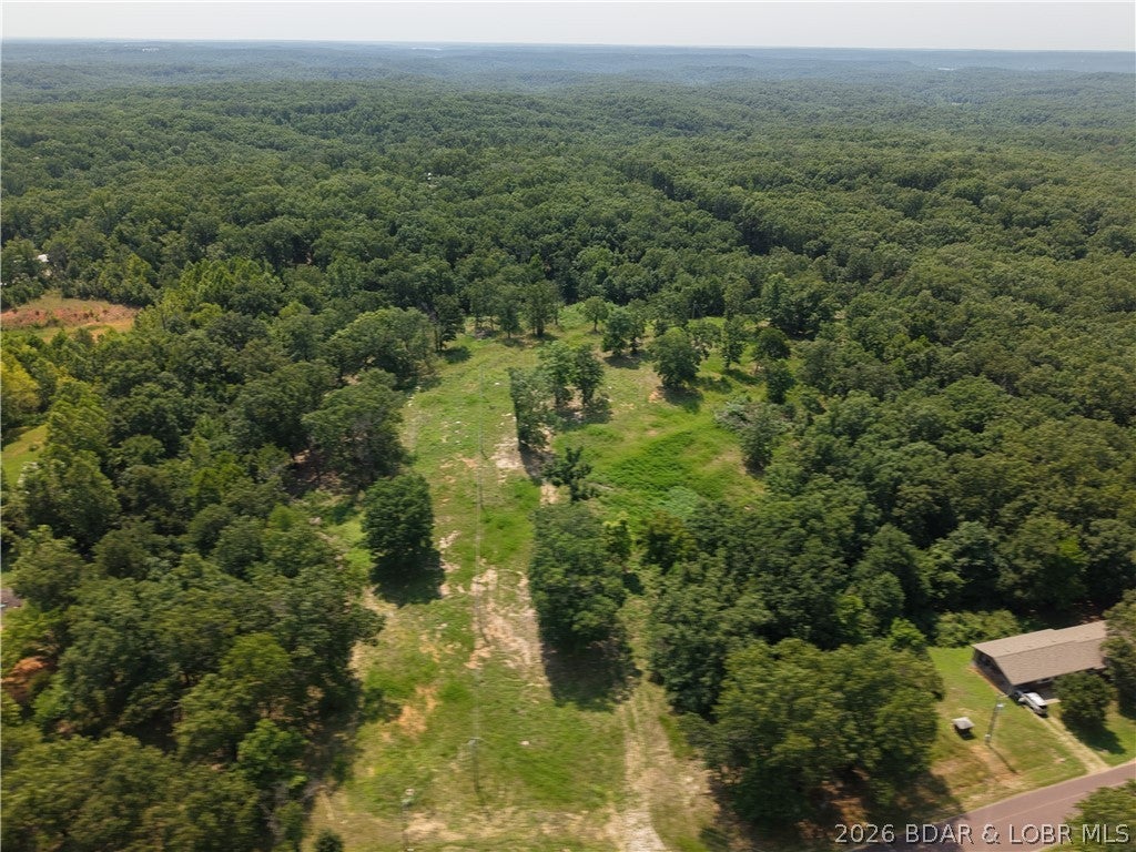 Bring your plans & take advantage of the possibilities this 10.77-acre tract on Cuptree Dr has to offer! Formerly used as a mobile home park, the property has been completely cleared with no old mobile homes remaining. The mostly level acreage could lend itself to a mobile home community, RV or camper spaces, storage, cabins, long-term rentals, a homesite with additional structures, or other residential/commercial use.

Located on a paved road just off Hwy 135 on the west side of Lake of the Ozarks, the property is less than 3 miles from Ozarks International Raceway and only minutes from Laurie. Electric has previously served the property, along with a drilled well & septic system, giving the next owner a valuable head start when bringing their plans to life.