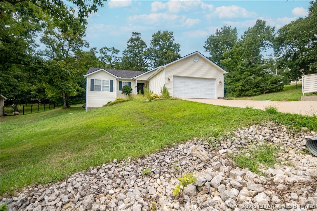 Welcome to 45 Evergreen Drive, a beautifully updated 3-bedroom, 2-bath home in the highly desirable Four Seasons community of Lake Ozark! Offering just under 1,300 square feet of thoughtfully designed living space with vaulted ceilings, this move-in-ready home has been extensively updated with a new roof, luxury vinyl plank flooring, water heater, water softener, whole-home water filtration system, new expansive deck, Waterproof liner under the house, and a remodeled kitchen with new appliances giving you peace of mind for years to come.

Living in Four Seasons means enjoying some of the best amenities at Lake of the Ozarks, including indoor and outdoor swimming pools, tennis and pickleball courts, playgrounds, dog parks, community centers, walking areas, and a fitness center. Conveniently located just minutes from some of the lake's premier dining destinations including H-Toads, Shady Gators, JB Hook's, and Baxter's, you'll love having entertainment, shopping, and the waterfront close by. Whether you're searching for a full-time residence or the perfect weekend retreat, this home offers the ideal combination of modern updates, exceptional amenities, and an unbeatable location.