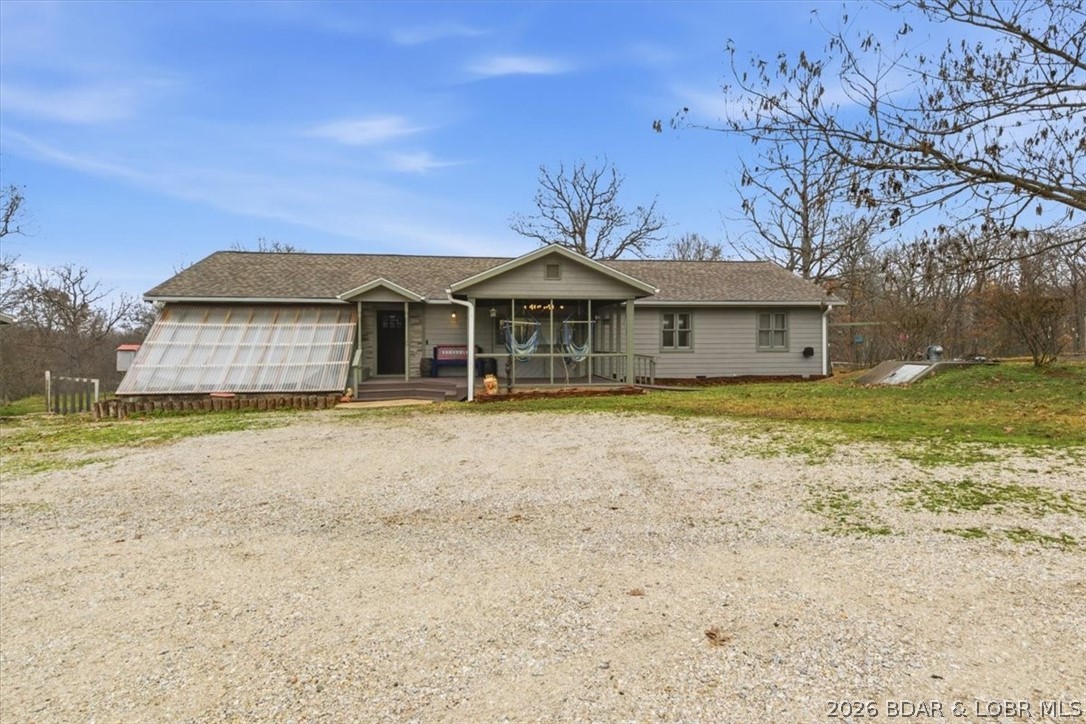 A homesteaders paradise! The quiet seclusion of this acreage offers endless possibilities, with a large pole barn, two smaller barns, large chicken coop, and oversized garage that features a walk-in freezer, prep kitchen space, and hoist for processing. The grounds have abundant wildlife, fruit trees, raspberry bushes, and the extra large garden with raised beds offers you the opportunity to grow your own variety of produce and cultivate them in your own greenhouse. The recently updated ranch style home offers four large bedrooms, two bathrooms, an open concept living, and a gorgeously updated kitchen opening up to the large back deck. With so many amenities, you'll need to come tour this one of a kind property yourself. Bring your hunting, homesteading, and gardening passions and make your dreams come to life in this forever home.