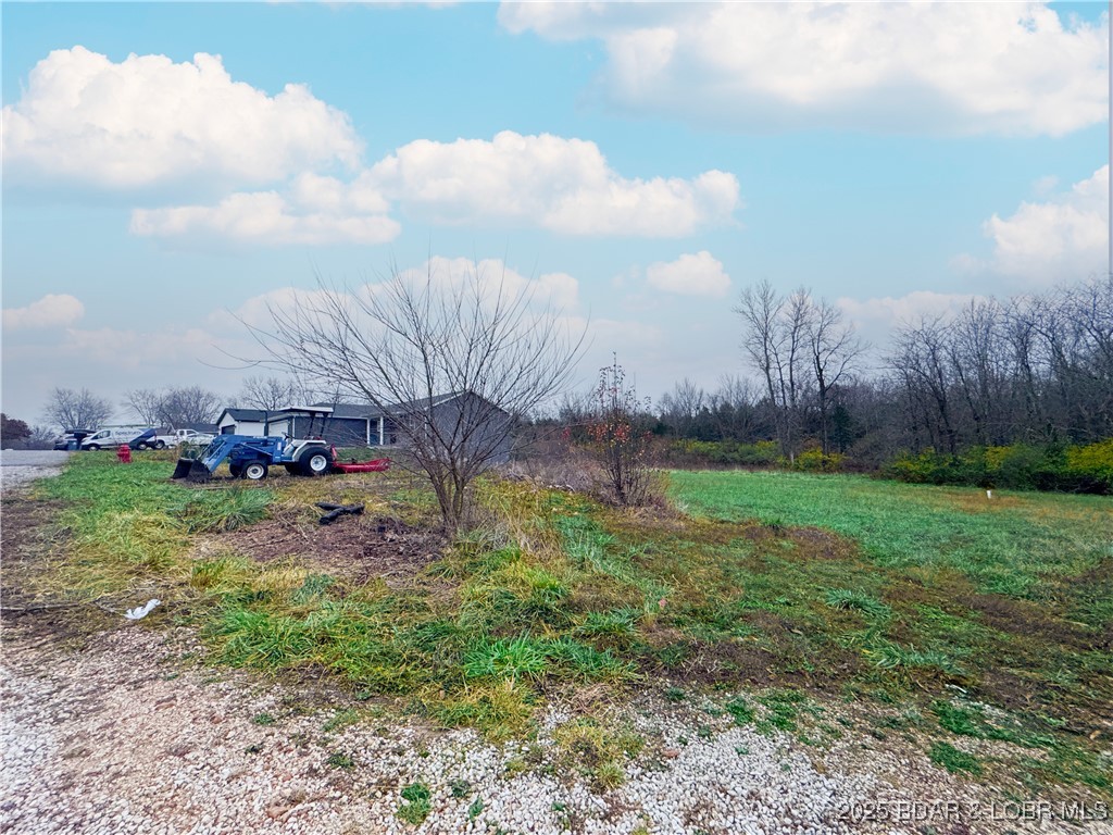 Build your future home on this .22-acre residential lot tucked just off W Bourbon Street in Eldon. This property offers a clean, level canvas with plenty of possibilities—whether you’re planning a starter home, downsizing, or investing in new construction. Public water, sewer, and electric access are available at the boundary, and the area already hosts well-established neighboring homes, giving you the comfort of a developed setting. This is a great opportunity for anyone wanting an affordable and buildable lot within city limits. Multiple lots are available. As the subdivision finishes out, the cul-de-sac will be blacktopped.  Use our builder or bring your own! Industry and shopping are nearby.