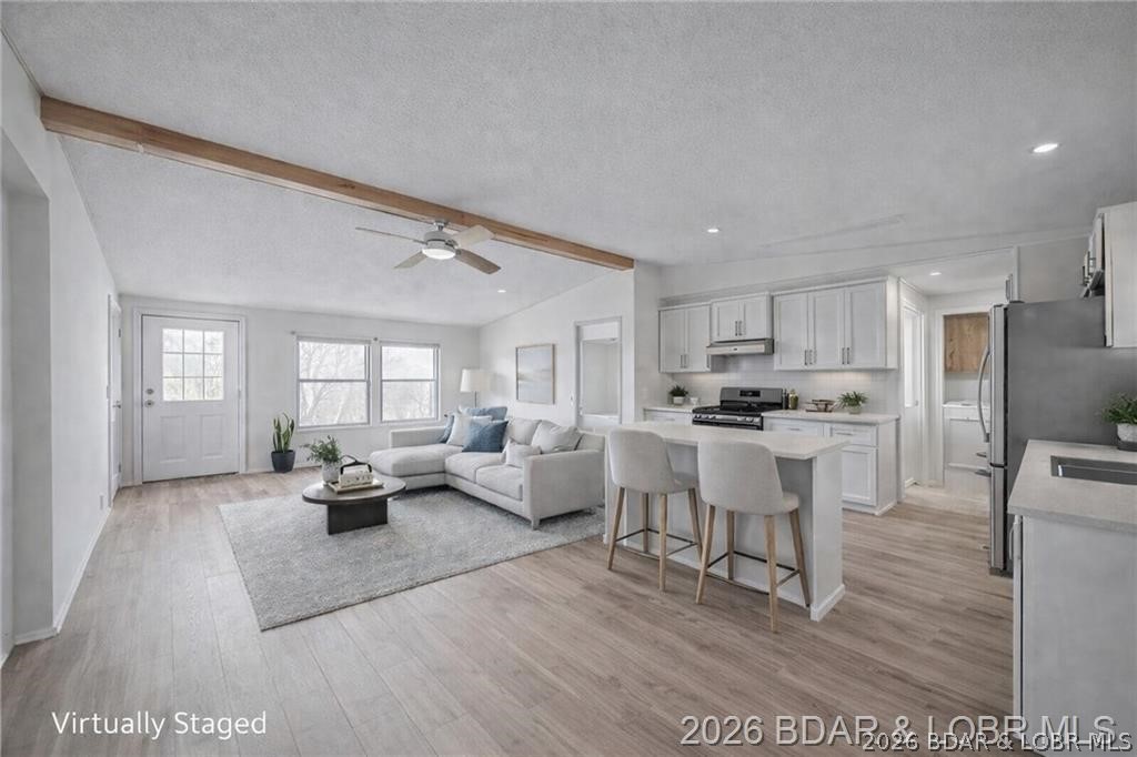 Some properties check the boxes. Others make you start thinking about what they could become. Set on 1.10 acres at the 39MM, this 4BR/3BA home offers the kind of opportunity that’s getting harder to find at the Lake—space, privacy, and room to create something even bigger over time. The main level was designed for easy living with an open gathering space, primary suite, and additional bedrooms, while the walkout lower level creates flexibility for guests, extended family, or a second living area. Outside, decks overlook the peaceful cove setting, giving you the kind of place where weekends naturally slow down and evenings last a little longer. And with flat ground near the home, there’s room to expand—whether that means adding a garage, extra storage, outdoor entertaining space, or continuing to invest into the property over time. Whether you’re searching for a full-time place at the Lake, a weekend escape, or a property with long-term rental and investment potential, this is the kind of opportunity that’s becoming harder to overlook.