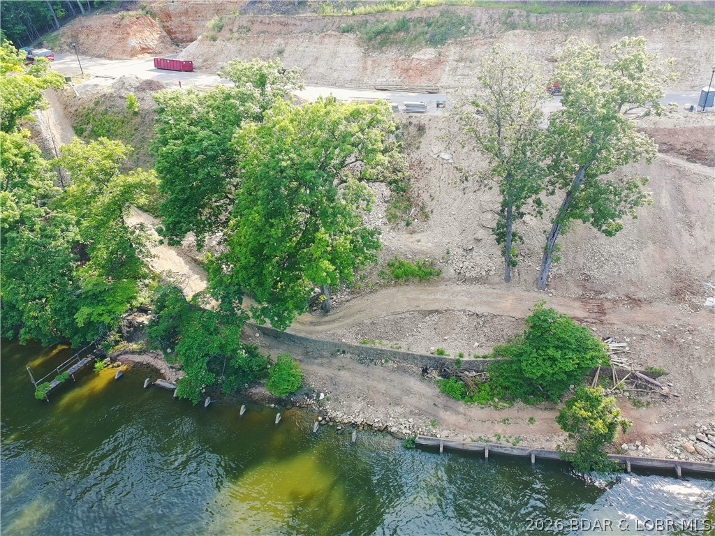 Be one of the first to buy your new lot at one of the Ozarks hottest new subdivisions, The Waters. The Waters is located at Horseshoe bend on the 3 MM of the lake. There are 27 different lot locations and each have their own unique layout and characteristics. Fantastic views of the 3 MM looking out onto the deep water cove. There are several great water hangouts like Boathouse, Tap & Grill, and Shady Gators only minutes away. Two amazing Four Seasons golf courses within 5 minutes, along with countless lake activities to enjoy. Supply is limited so do not hesitate. Take your once in a lifetime opportunity to build your dream home at The Waters today!