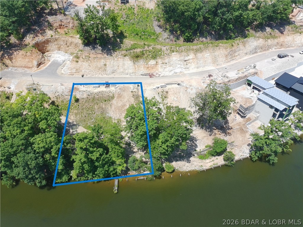 Be one of the first to buy your new lot at one of the Ozarks hottest new subdivisions, The Waters. The Waters is located at Horseshoe bend on the 3 MM of the lake. There are 27 different lot locations and each have their own unique layout and characteristics. Fantastic views of the 3 MM looking out onto the deep water cove. There are several great water hangouts like Boathouse, Tap & Grill, and Shady Gators only minutes away. Two amazing Four Seasons golf courses within 5 minutes, along with countless lake activities to enjoy. Supply is limited so do not hesitate. Take your once in a lifetime opportunity to build your dream home at The Waters today!