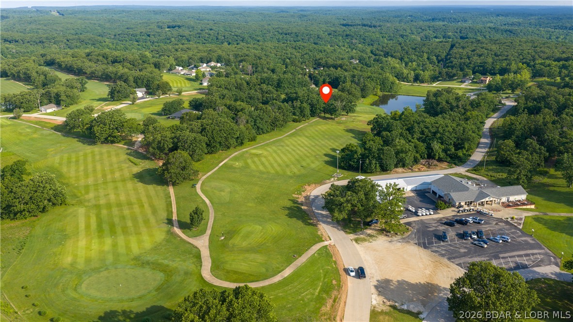Bring your vision to life on this beautiful golf course lot nestled in the heart of Indian Rock Estates. Perfectly positioned between the 10th green and 11th tee box of Indian Rock Golf Club, this exceptional 0.56-acre homesite offers a rare combination of privacy, prestige, and picturesque golf course views in one of the area’s most desirable golf communities. With gentle topography and mature trees, the property creates the perfect backdrop for a custom home designed around your lifestyle. Whether you’re envisioning a full-time residence, a weekend getaway, or a future investment, there’s ample space to create a one-of-a-kind retreat with inviting outdoor spaces and room to truly make it your own. Tucked away at the end of Bogey Lane, the setting feels peaceful and secluded, surrounded by rolling greens and natural beauty. Enjoy quiet mornings overlooking the course, relaxing evenings in the calm surroundings, and the luxuries that come with life in an established golf community. Whether you’re ready to build now or planning for the future, this property offers an incredible opportunity to create something truly magnificent at the lake.