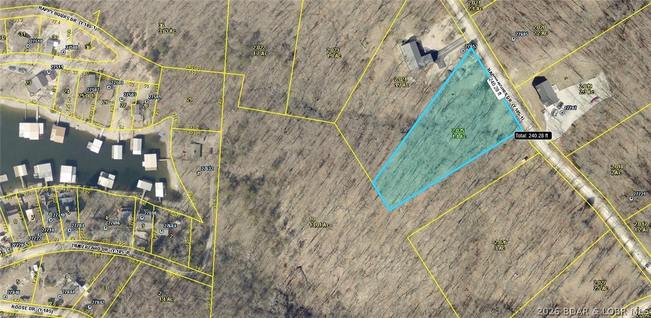 1.4 Acre Building Lot with Seasonal Lake View. Wooded Lot has Electric close by. This is the perfect country setting to build your dream home in this spacious and quiet subdivision with well maintained roads. Community water and sewer available. Located minutes from Jolly Rogers Restaurant and only 20 minutes to Lake of the Ozarks Famous Bagnell Dam Strip for Shopping, Restaurants & Entertainment. Home & extra Lots also for sale.
