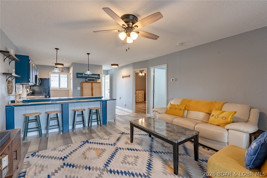 Looking for a condo close to ALL the action? This 2BR/2BA condo is located in the heart of some of the BEST entertainment, dining and nightlight at the Lake of the Ozarks. Being just steps away from Camden on the Lake, The Toad and Shady Gator/Lazy Gator, you will have plenty of options to choose from. Updated in 2021, this condo has luxury vinyl flooring, newer appliances, fixtures and paint. The water heater and HVAC are newer, within 2 years! With lake views on both sides on the unit, you are sure to enjoy your morning coffee or an evening cocktail. Don't miss your opportunity to snag this property. Schedule your tour TODAY!