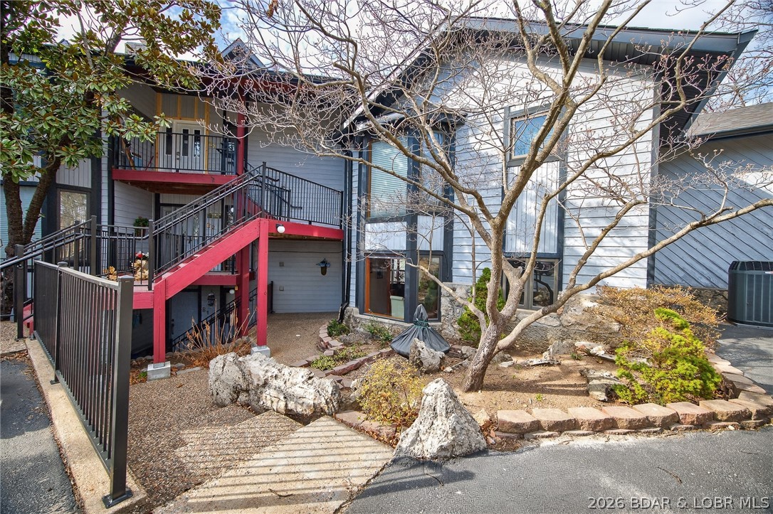 Come see this perfectly laid out condo that comes fully furnished, perfect for vacation rentals or your own special getaway place! This home was very well taken care of and features large deck space and awesome views of the amazing Lake of the Ozarks. There are two bedrooms and two full bathrooms, beautiful functional kitchen, dining area with tons of natural light and gorgeous living room space featuring mirrors and even a fireplace! Each bedroom has their own access to the large deck space, where you can catch the wonderful view of the Lake! Spend some time outside as it is a peaceful haven, just as much as the inside is! This is a main level unit with only a few steps to the door and ground level parking! Just minutes from so many local amenities right near the heart of Osage Beach and Lake of the Ozarks! Projected Theme Park to be built right across the street, so this will be an excellent place to stay while vacationing! Video Tour Available!