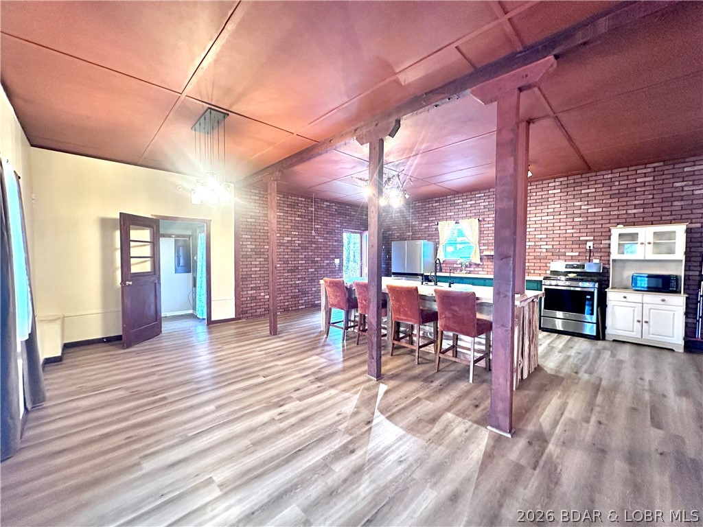 MOTIVATED SELLER! Enjoy the lake lifestyle without the lakefront price tag in this well-maintained 2-bedroom, 2-bath home located in a quiet lake community near Lake of the Ozarks. This property offers private community access to a boat ramp and a shared dock for swimming or fishing, providing easy access to the water without the maintenance and cost of lakefront ownership. With approximately 1,800 square feet of living space, this home offers a comfortable and functional layout suitable for full-time living or a weekend retreat. The generous living areas provide flexibility for entertaining, relaxing, or hosting guests, while the two-bathroom layout adds convenience for everyday living. Situated in a peaceful community setting, this property allows you to enjoy lake recreation, boating, and outdoor activities while remaining removed from the congestion often associated with waterfront homes. Whether you’re looking for a primary residence, a second home, or a recreational getaway, this property delivers a balanced combination of space, access, and value. This is your chance to enjoy the Lake of the Ozarks area with affordability, convenience, and community amenities.