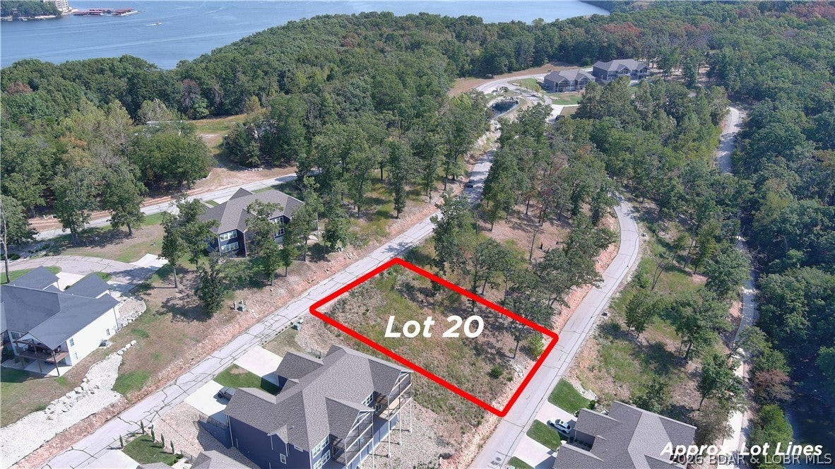Amazing opportunity to purchase a lot with a water view in a well established subdivision. This lot will allow you to build a private home or a Villa in the Villas of Tuscany Subdivision. This location is one of the most ideal lots within the subdivision. Amenities are already in place with water & sewer, internet access through Spectrum. You will enjoy the amazing pickle ball court, community pool & bath house, and golf cart path down to the community docks. Community dock slips are available for additional purchase. Note- proposed structure shall be approved by Architecture Review Committee and landscaping will also need to be approved. (Subdivision will maintain landscaping of home, just as a Villa). Buyer to verify hook-up fees to water & sewer. Great opportunity to build your dream home that allows for some maintenance free lake enjoyment or a Villa for yourself or for investment. Wonderful location by land and water.