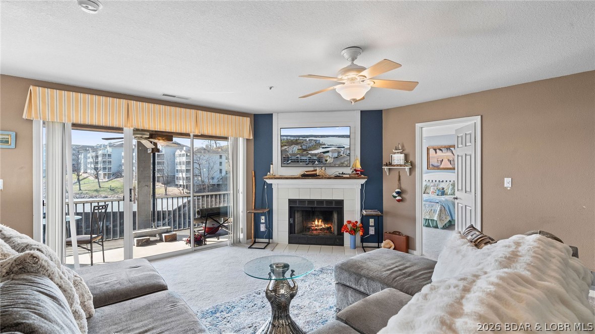 Seller will pay the rest of the 2026 HOA dues with an acceptable offer! Don’t miss this beautifully updated, turnkey 2-bedroom, 2-bath end-unit condo in Regatta Bay. The desirable end-unit location offers added privacy, extra natural light, and the convenience of being just steps from the parking area. Relax on your lakeside deck while enjoying beautiful main channel views, and keep an eye on your included 12x30 boat slip, which is visible directly from the condo. The spacious grassy area just outside the unit is perfect for outdoor games, pets, or simply enjoying the lake lifestyle. The kitchen features newer appliances, and the washer and dryer are included, making this property truly move-in or rental ready. Regatta Bay is a highly sought-after complex offering pools, tennis and pickleball courts, clubhouse, playground, and beautifully maintained grounds. Nightly rentals are allowed, making this an excellent opportunity for a full-time residence, vacation getaway, or income-producing investment. Located at the 12 MM, you’ll enjoy quick access by water or land to popular waterfront restaurants, shopping, golf, entertainment, and the Bagnell Dam Strip is just minutes away.